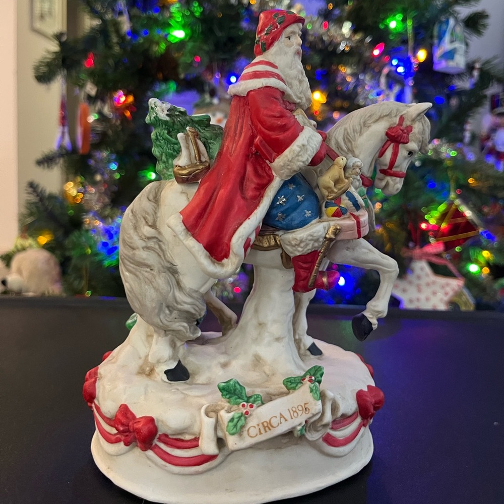 Holiday limited edition musical Santa figurine